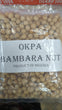 Packaged Bambara nuts with 'OKPA' label on a clear background